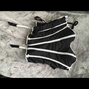 Never worn corset with detachable straps/garters.